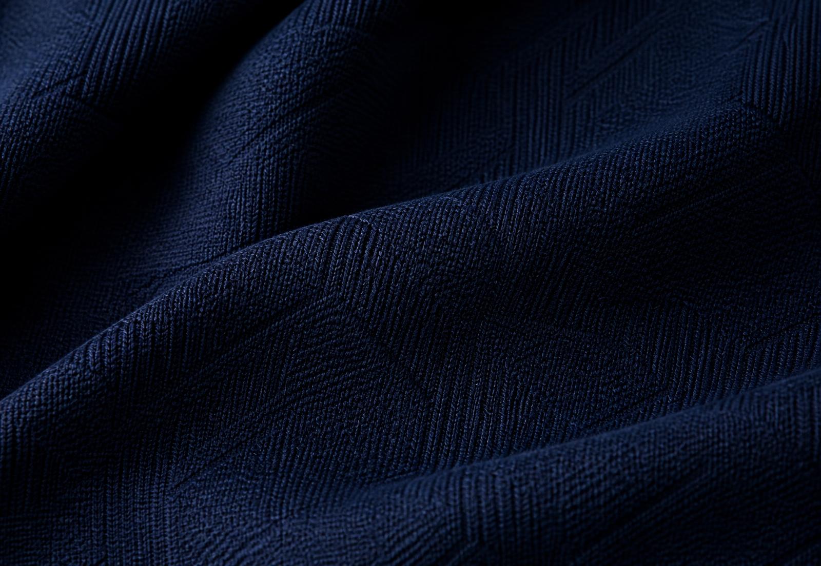 Dense circular-knitted jacquard with pattern formed by the knit structure